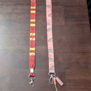 Two lanyards, rainbow Yoobi and Gryffindor